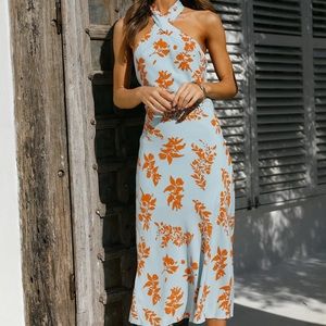 New without tags, open back halter dress